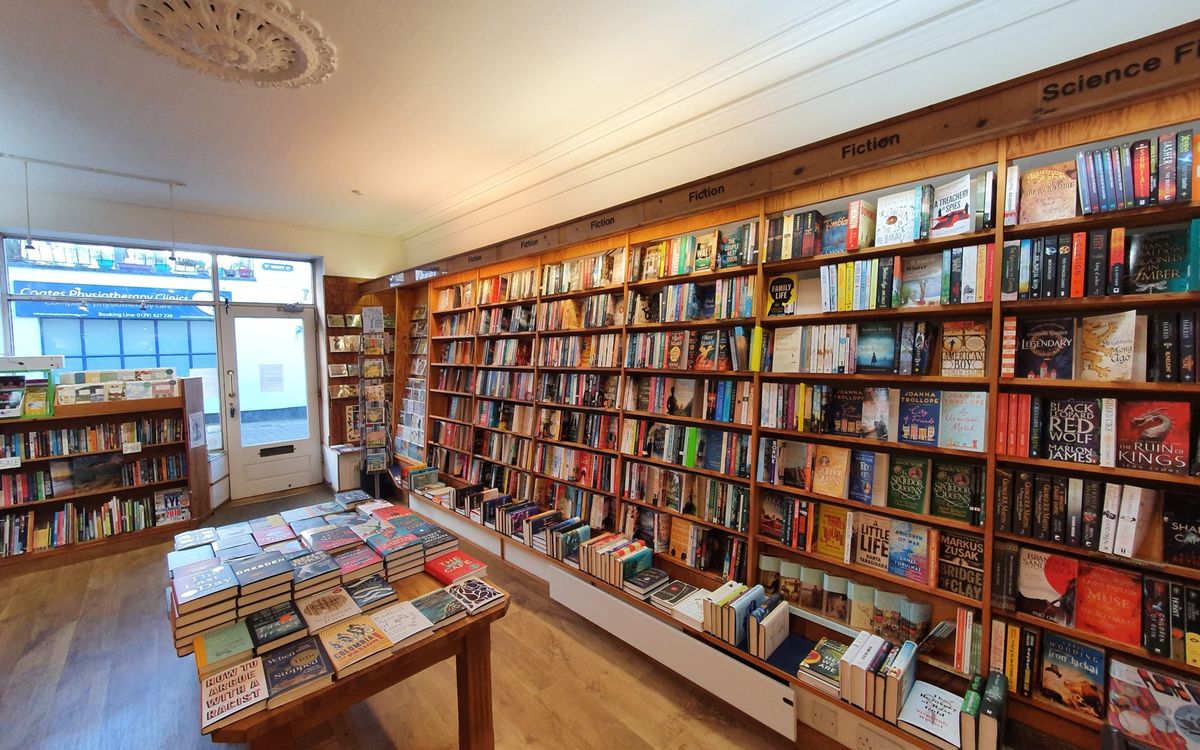 The wooden shelves inside Chepstow Books & Gifts